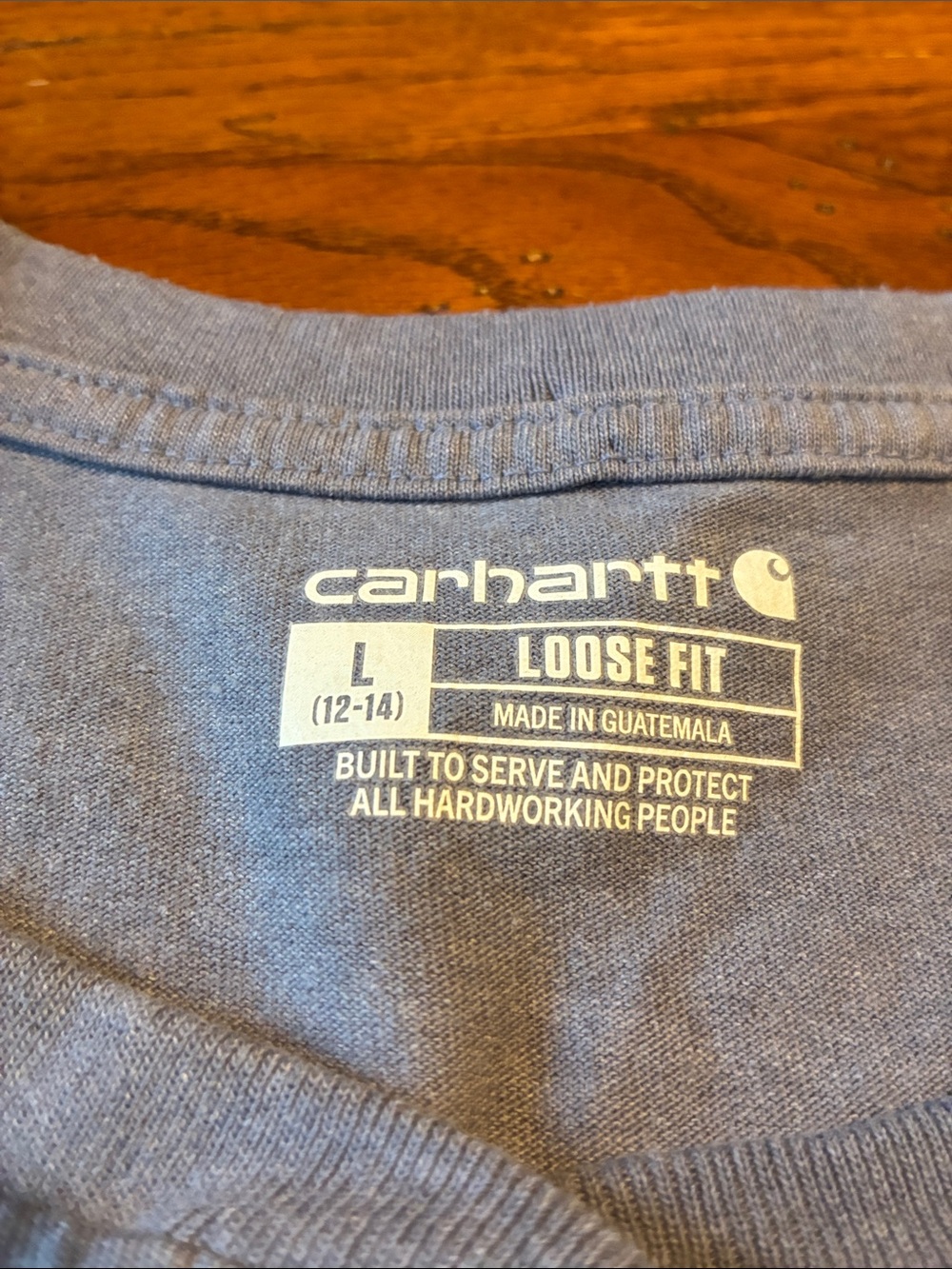 Carhartt woman’s Short-Sleeve Henley Pocket Tee in Heather Blue - Picture 2 of 5